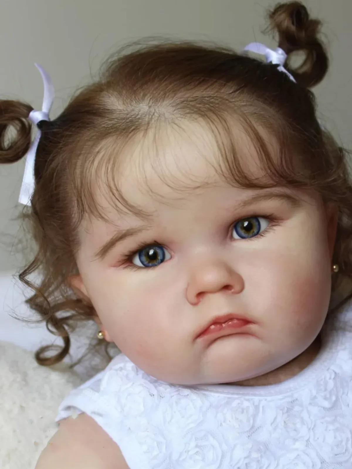 24" Realistic Lifelike Baby Doll with Curly Hair in Elegant White Dress