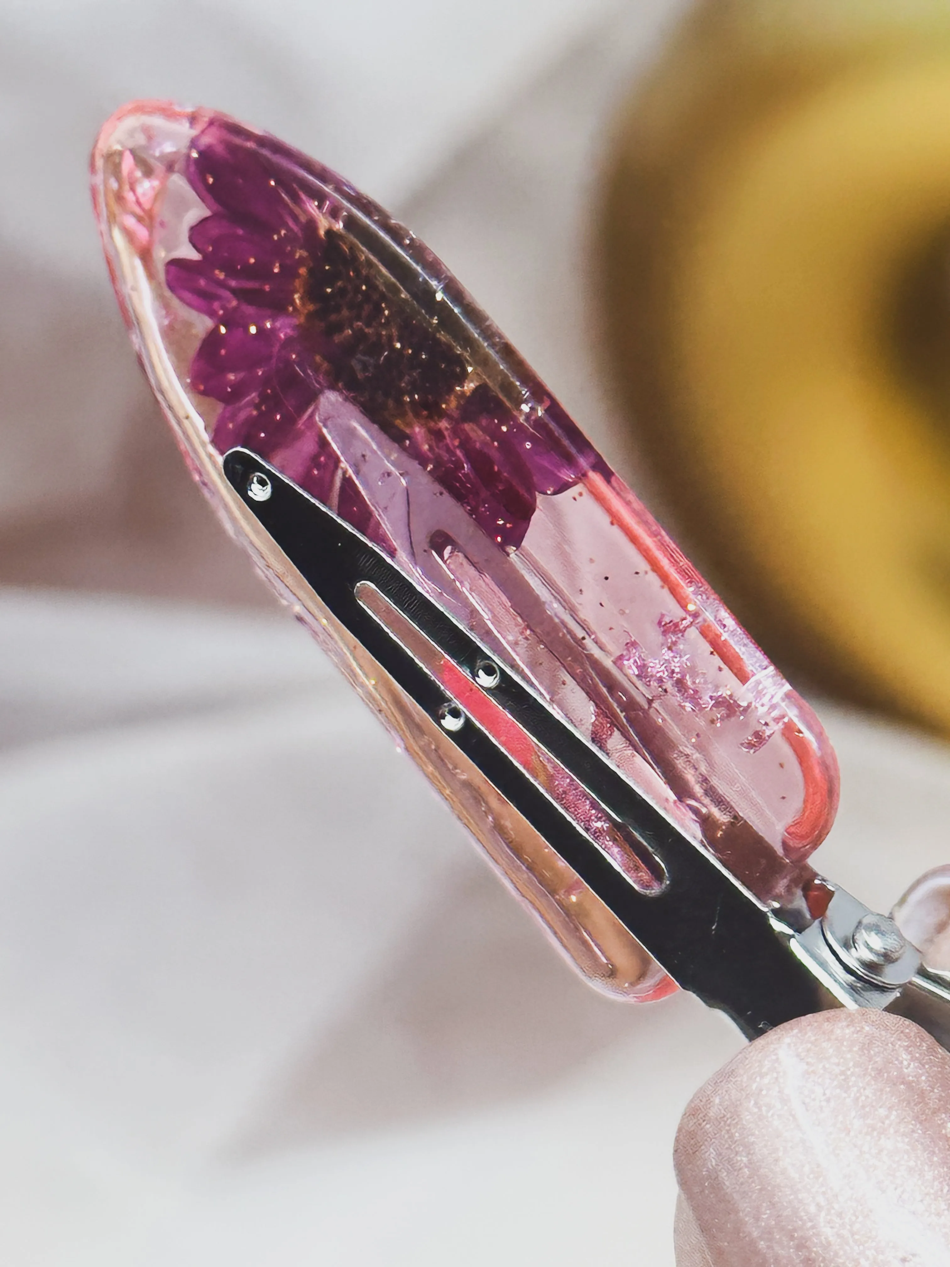 Pink No dent resin clip with Real Pink and Magenta Toned Flowers Cast Inside.
