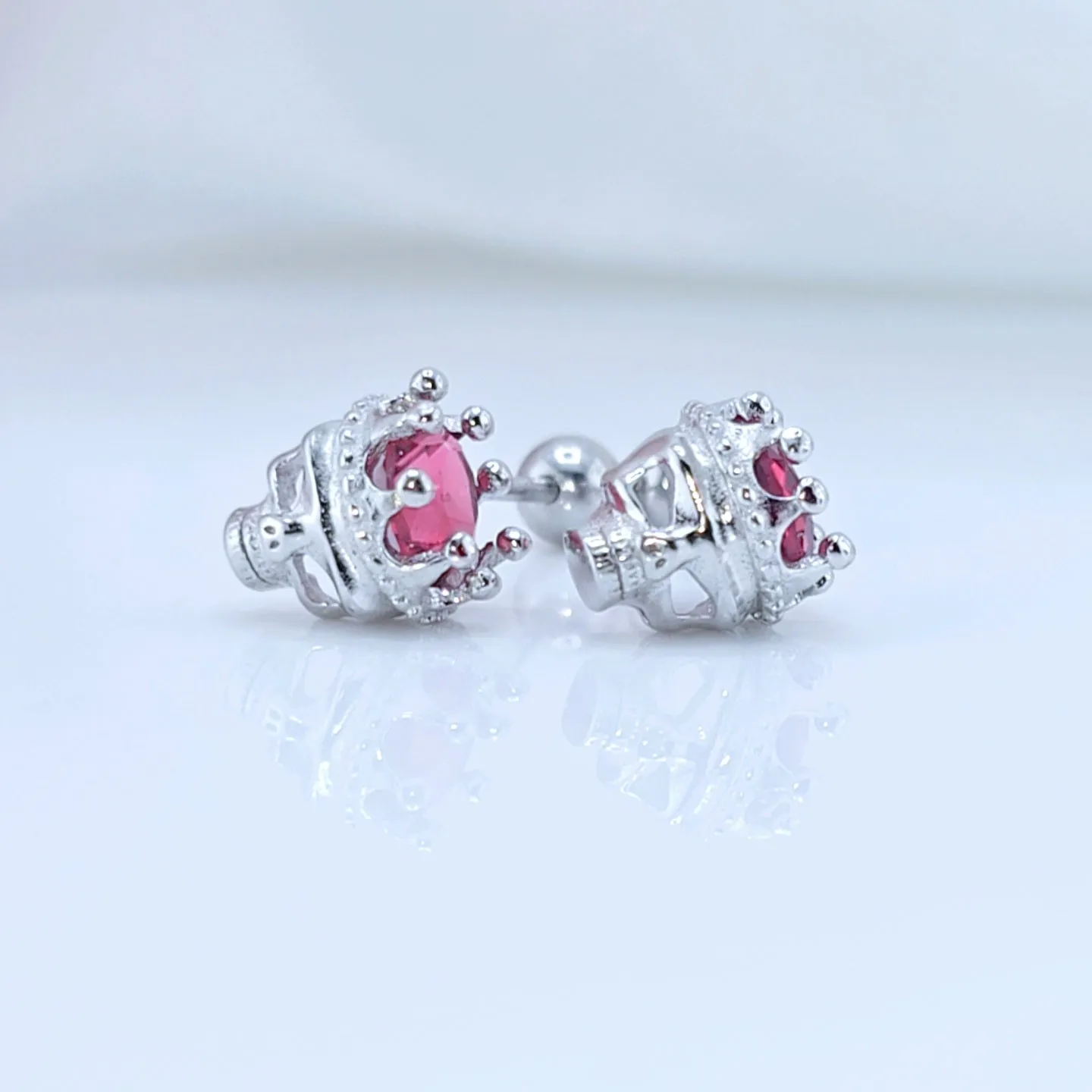 Rose Gold Crowned Skull Head Screw Stud Earrings